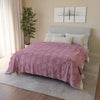 Fleece Blanket | Vibrant Mauve | On top of the bed