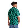 A man wearing Black button Tropical Hawaiian Shirt with fish print back view